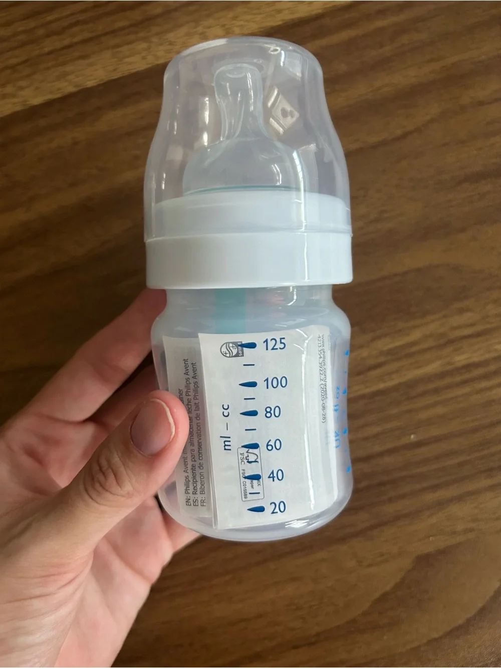 Philips Avent Clear Baby Bottle with White Cap and Teal Accent
